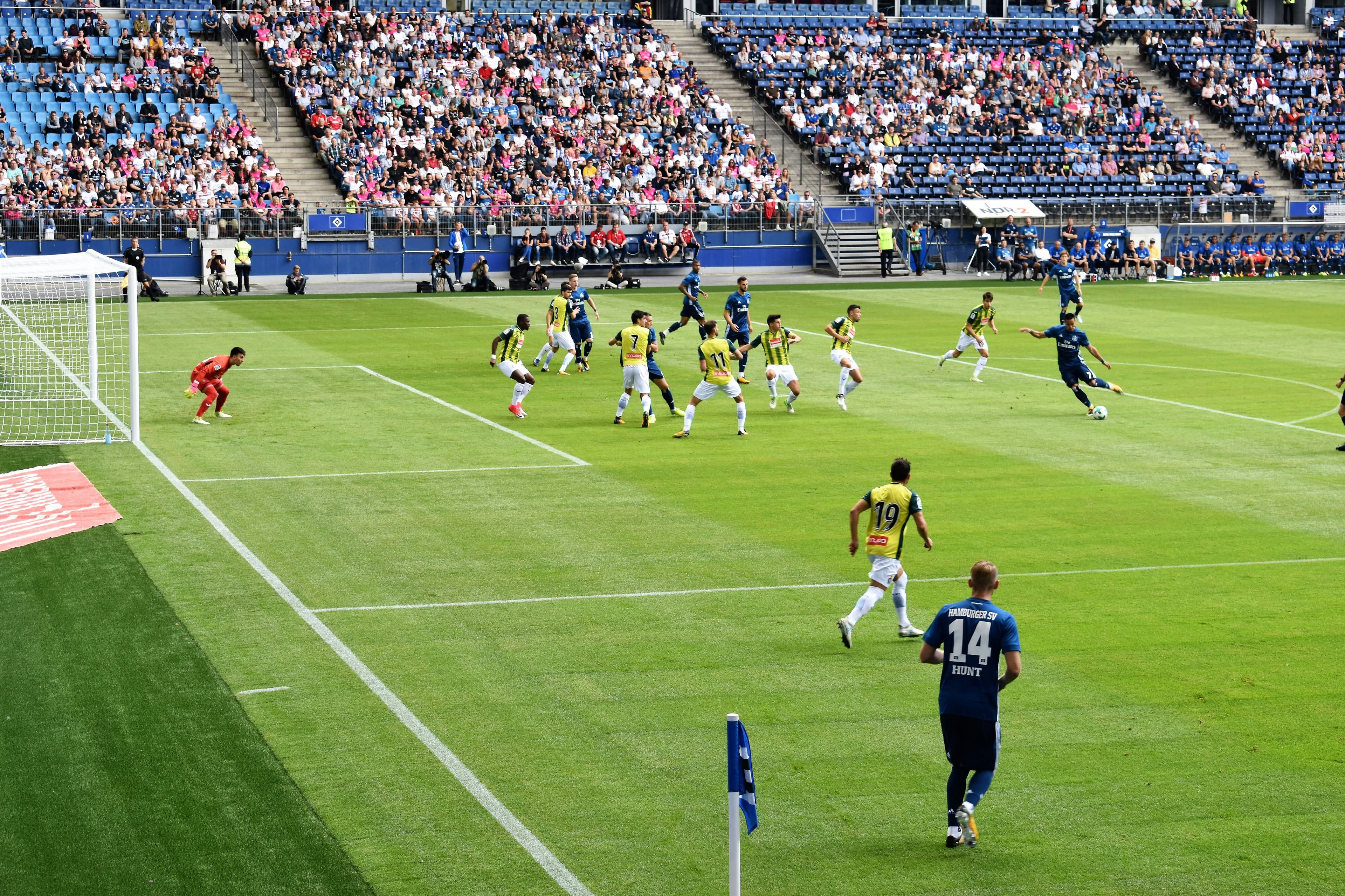 Live match action — players competing for the ball